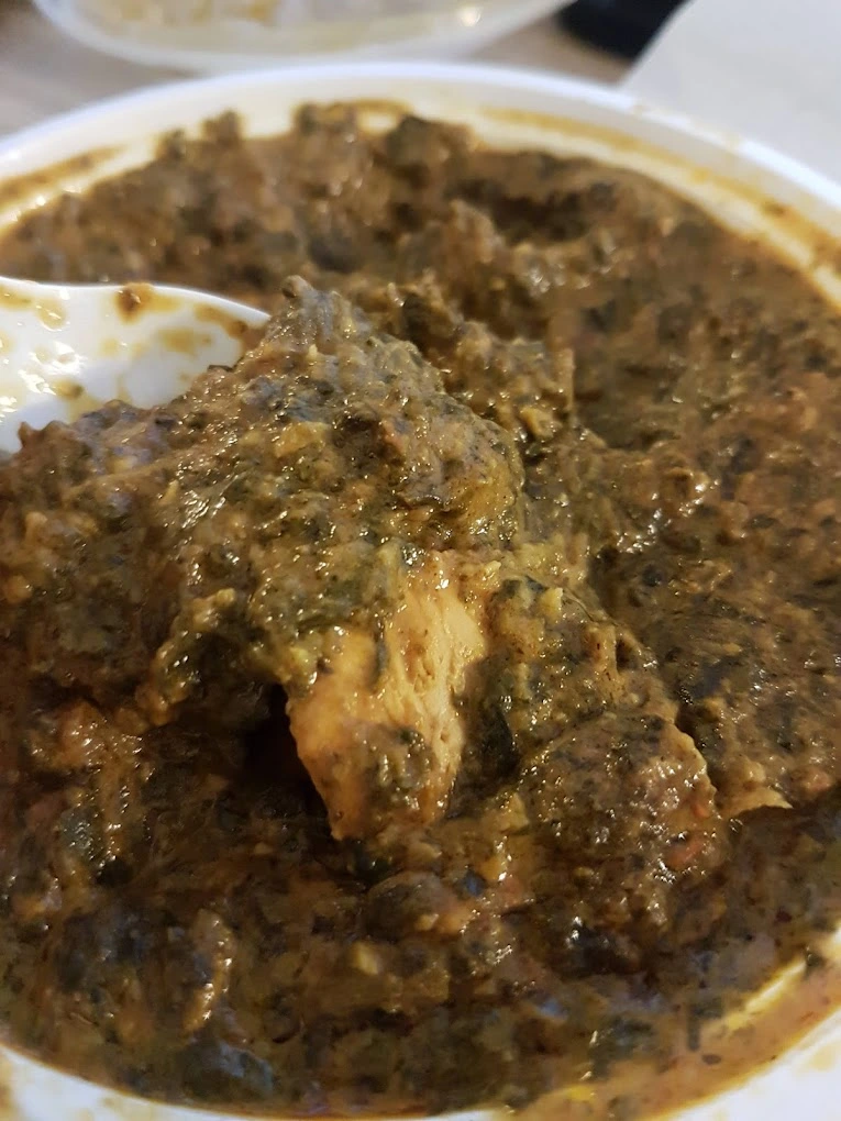 Aromatic chicken biryani with saffron basmati rice - Indian restaurant Granada Blvd